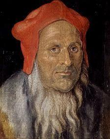 portrait d'un homme barbu avec la hotte rouge