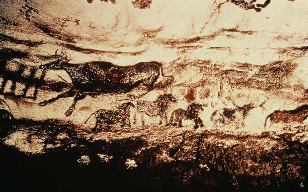 Rock painting of a leaping cow and a frieze of small horses à Anonyme
