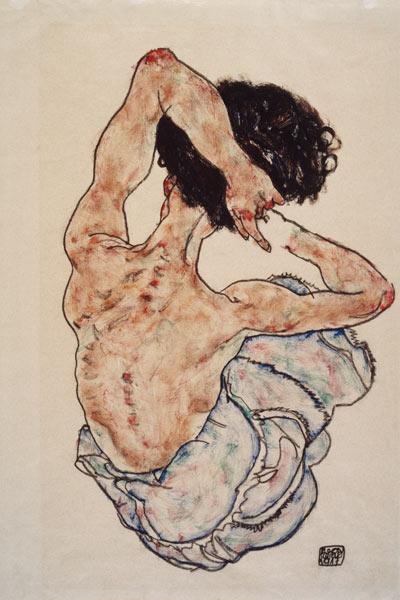 Femme avec les mains croisées, vue de dos