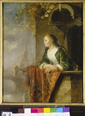 Jeune femme sur un balcon