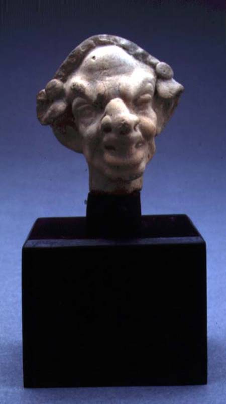 Grotesque head of a woman à Art Grec
