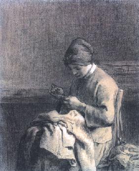 femme faisant des retouches sur un vêtement