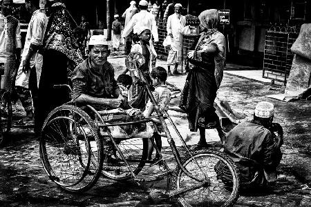 Asking for some help outside a mosque after Friday prayers - Bangladesh