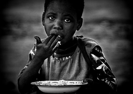 Eating rice - Benin