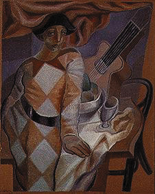 l'harlequin à Juan Gris