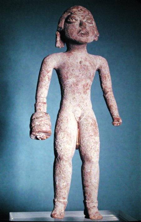 Figurine of a tlachtli player with a gauntlet on his right hand, from Mexico, Pre-Classic Period à Mayan