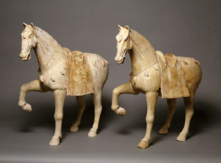 A Pair Of Buff Pottery Figures Of Prancing Caparisoned Horses à 