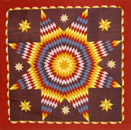 A Pieced And Appliqued Cotton Quilted Coverlet à 