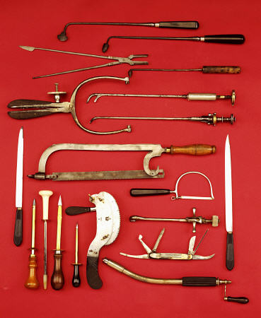 A Selection Of Medical Equipment Including Knives, Saws, Bullet Extractors,  Cauterisers, Lithotrite à 