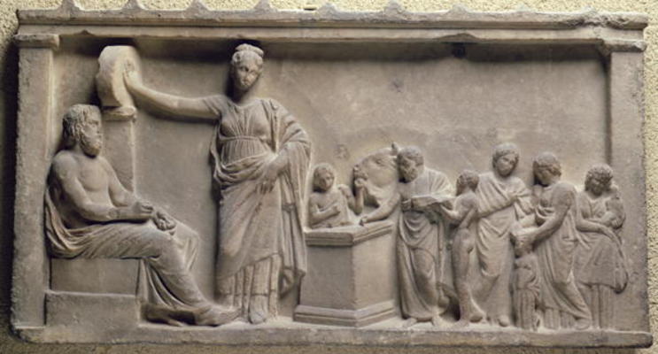 Votive relief depicting a family sacrificing a bull to Asclepius, the god of health and his daughter à 