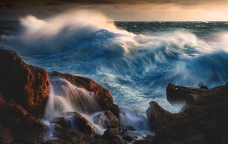 BLUE WAVE AT SUNSET