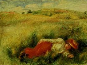 Jeune femme, allongé dans un pré vert.