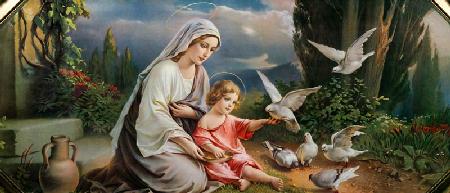 Marie et l'enfant Jésus jouant avec des pigeons dans un paysage idéalisé